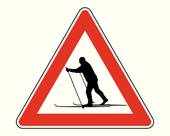 XC skier road warning sign